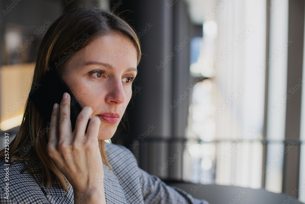 Happy successful business woman calling with cell telephone, Portrait of business woman making call via smart phone Happy successful business woman calling with cell telephone, Portrait of business woman making call via smart phone
