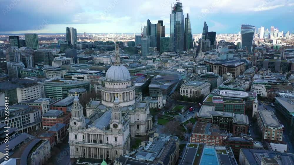 Aerial drone video of iconic Saint Paul landmark Cathedral in the heart of City financial district of London, United Kingdom