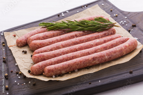 Food concept - Traditional raw horse meat sausage, top view