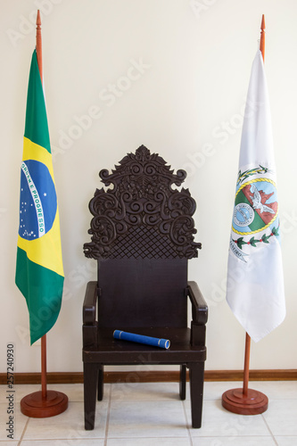graduation chair and straw, with flags of brazil and state of rio de janeiro