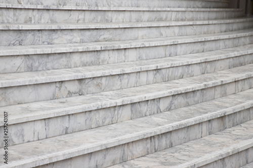 curve marble stair. outdoor white stone steps.