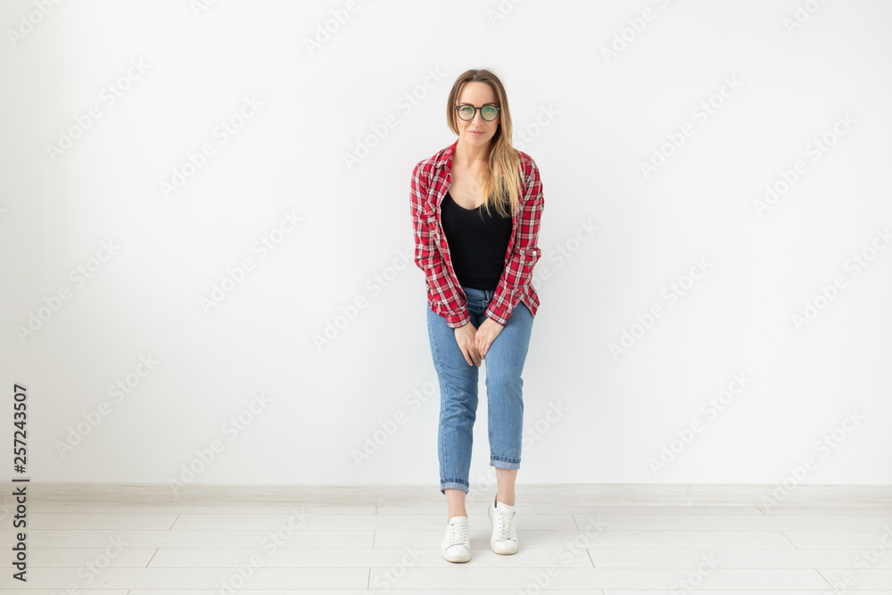 people, beauty and fashion concept - portrait of a pretty smiling woman posing on a white background people, beauty and fashion concept - portrait of a pretty smiling woman posing on a white background