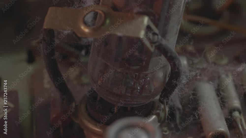 Old Electronic TV details full of dust dirt and spiderweb, macro shot Old Electronic TV details full of dust dirt and spiderweb, macro shot