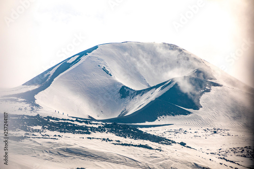 One of craters of volcano Etna in snow in winter, Sicily, Italy photo