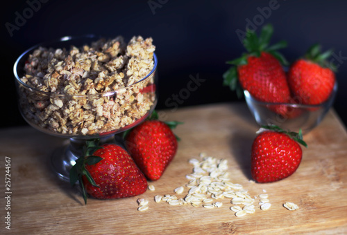 Healthy breakfast with strawberry, cereals and oats