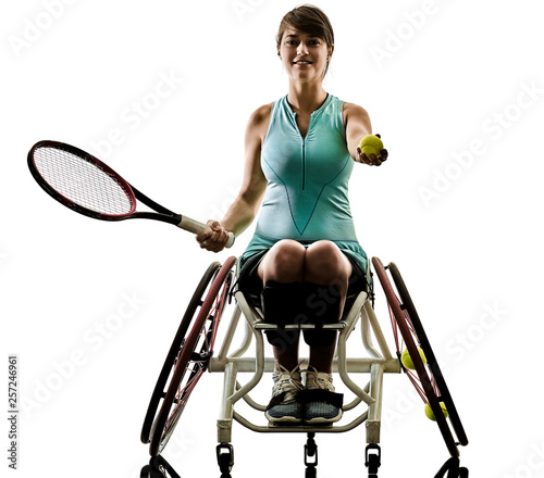 one caucasian young handicapped basket ball player woman in wheelchair sport tudio in silhouette isolated on white background photo