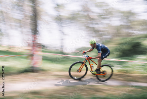 Cadiz, Spain - 24 March 2019: Participants of the third edition of the mountain bike championship. Photographs made with the sweeping technique.