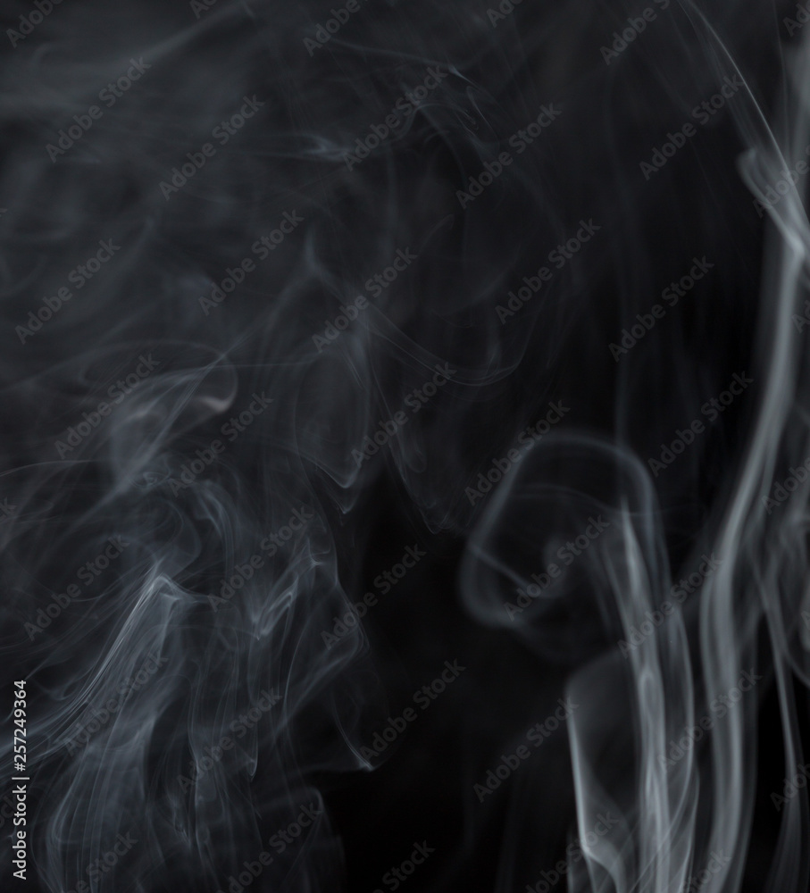 Abstract white smoke on black background