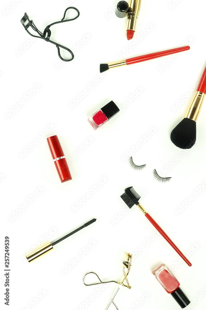 Makeup cosmetic accessories products brushes, lipstick on white background top view, flat lay. Copy space Makeup cosmetic accessories products brushes, lipstick on white background top view, flat lay. Copy space