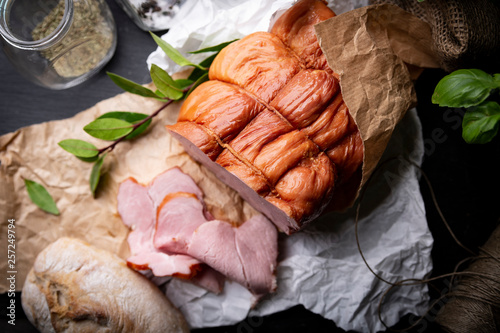 Smoked sirloin with homemade bread. Appetizing traditional pork ham.