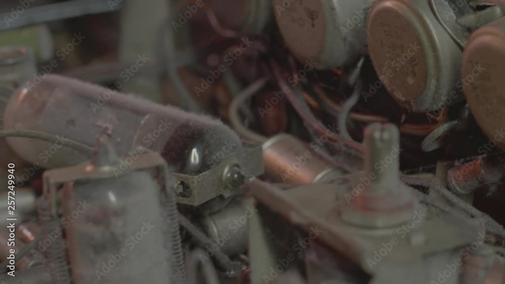 Old Electronic TV details full of dust dirt and spiderweb, macro shot Old Electronic TV details full of dust dirt and spiderweb, macro shot