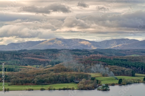 Fototapeta Naklejka Na Ścianę i Meble -  A panoramic view of the Windermere and the Coniston fells in the English Lake District.