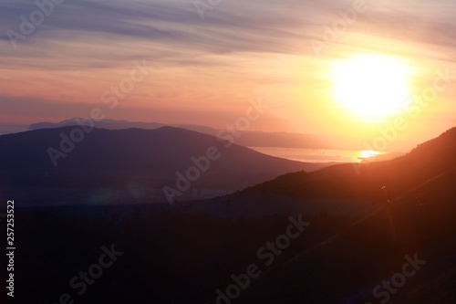  mountains on sunset background