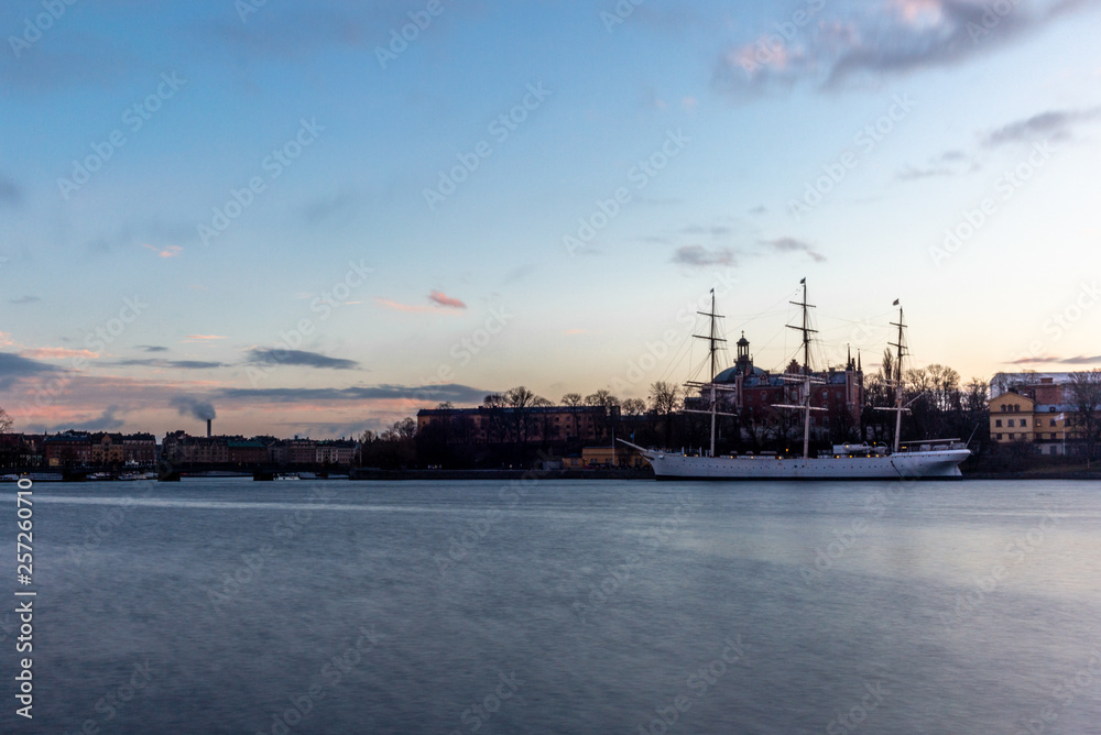 An old white sailing ship  in Stockholm during a colorful sunrise - 3