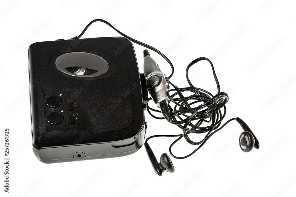 Close up view of audio player and headphones isolated. Old technology backgrounds. Close up view of audio player and headphones isolated. Old technology backgrounds.