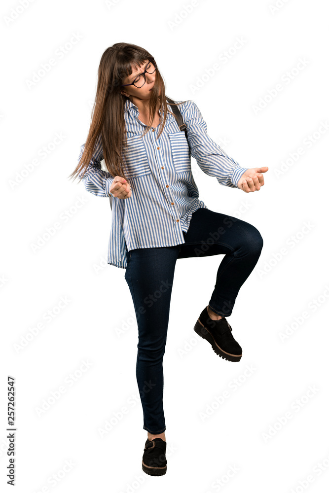 Full-length shot of Woman with glasses celebrating a victory in winner position Full-length shot of Woman with glasses celebrating a victory in winner position