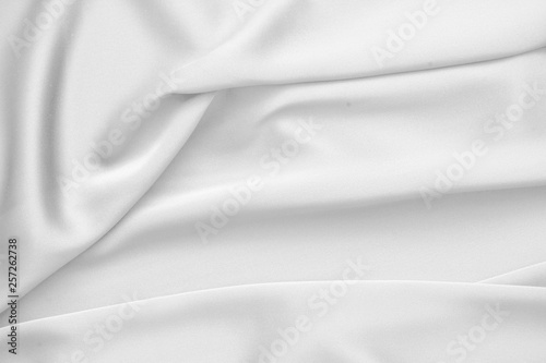 Rippled white silk fabric satin cloth waves background © VERSUSstudio