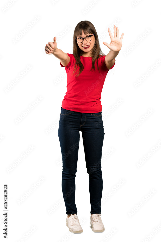 Full-length shot of Woman with glasses counting six with fingers Full-length shot of Woman with glasses counting six with fingers