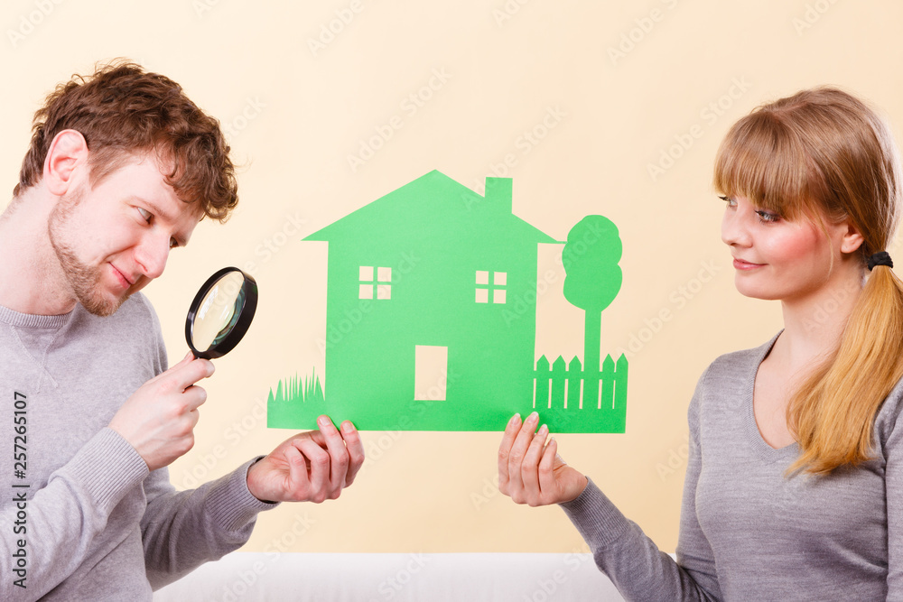 Young pair give attention to details. Young pair give attention to details.