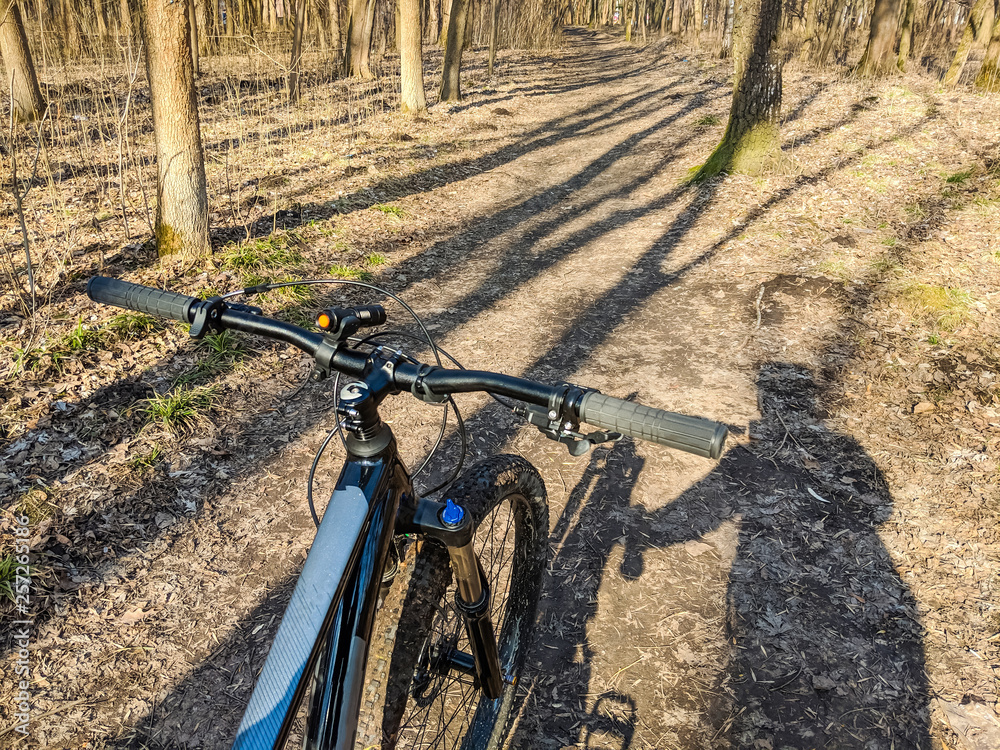 MTB bicycle on the trail in the spring season MTB bicycle on the trail in the spring season