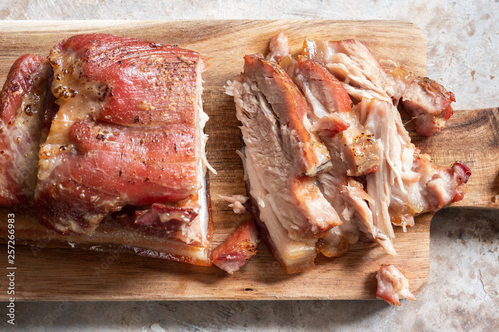 Fototapeta premium Baked carameled pork belly on a board