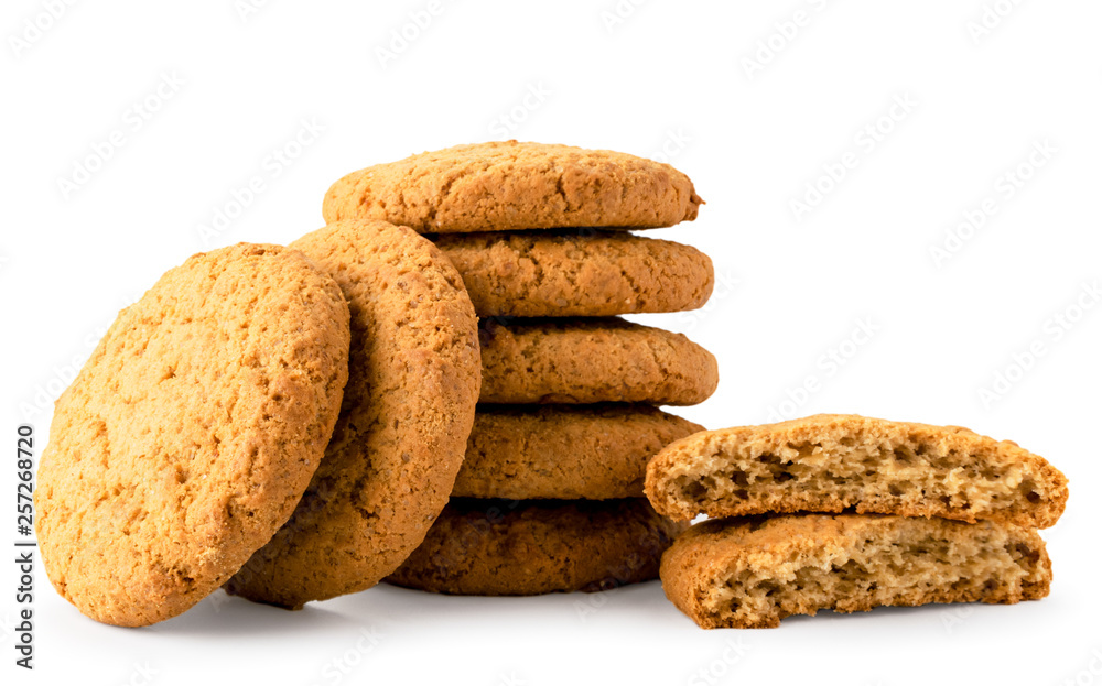 Oatmeal cookies stack and halves on a white, isolated.