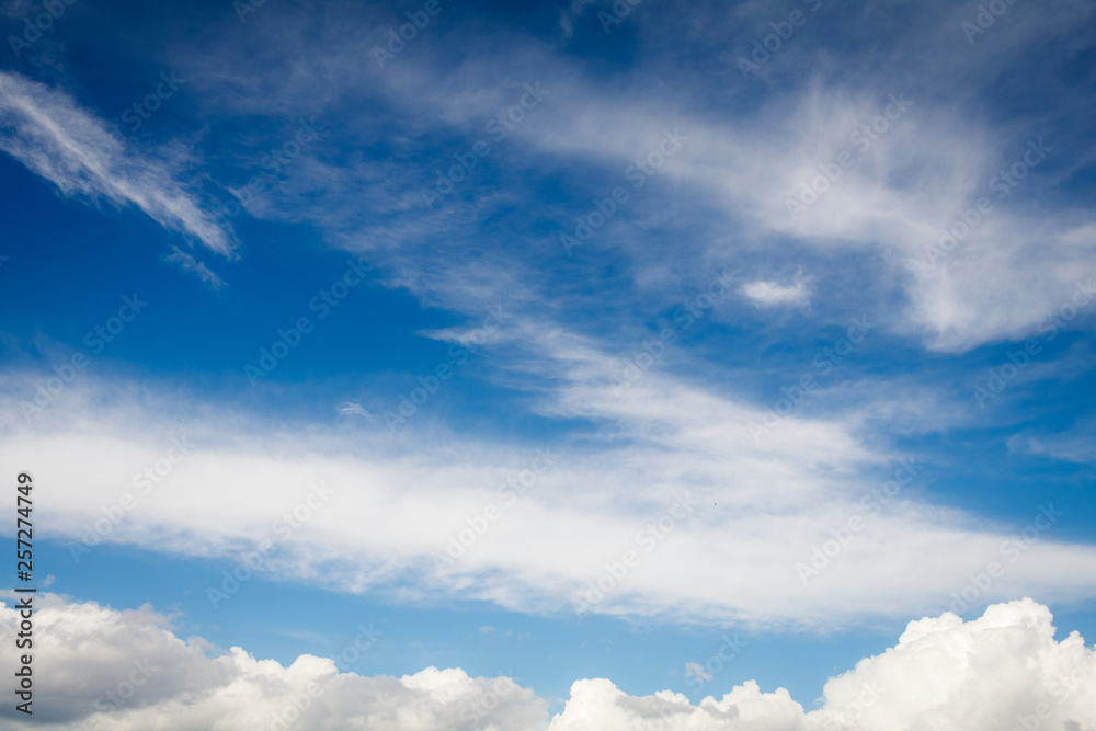 Blue sky with white clouds.