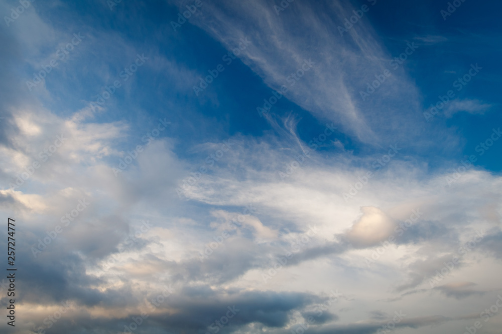 Blue sky with dramatic sunset clouds Blue sky with dramatic sunset clouds