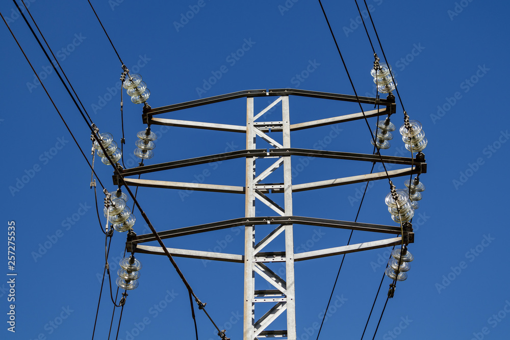 Electrical pylon against a clear blue sky in La Coruna Spain Electrical pylon against a clear blue sky in La Coruna Spain