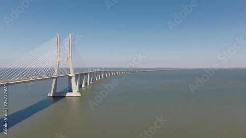 Vasco da Gama Cable stayed bridge river tagus in lisbon Portugal aerial shot 4k