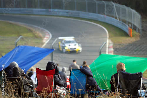 Spectators on racetrack - Stockphoto photo