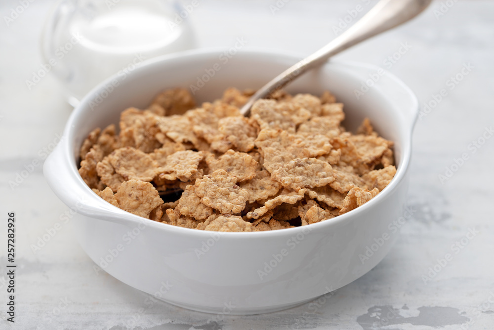cereals in white bowl with milk cereals in white bowl with milk