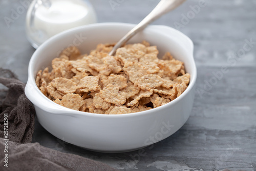 cereals in white bowl with milk