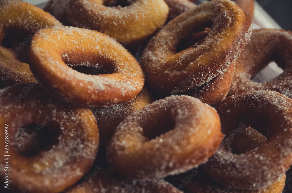Homemade donuts with sugar on top Homemade donuts with sugar on top