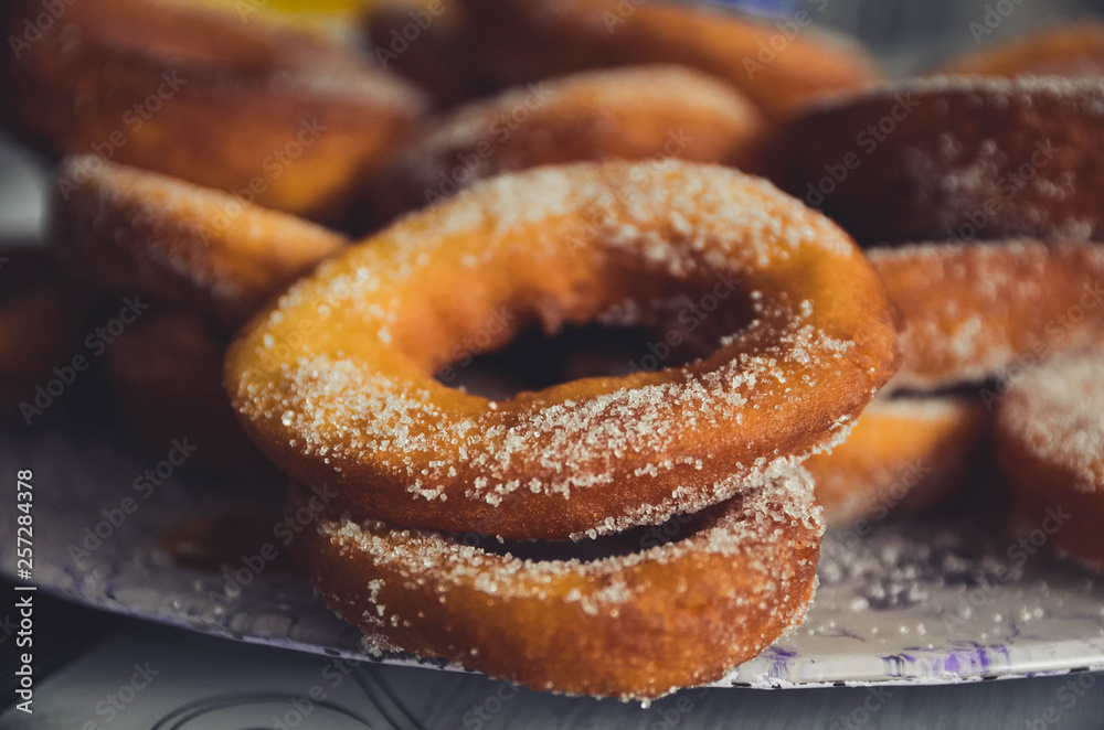 Homemade donuts with sugar on top Homemade donuts with sugar on top