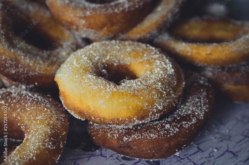 Homemade donuts with sugar on top Homemade donuts with sugar on top
