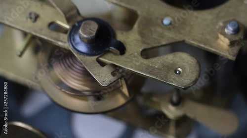 Wallpaper Mural Old vintage clock mechanism working, closeup shot with soft focus. Close up of a internal clock mechanism. Vintage Watch Movement Macro. Torontodigital.ca