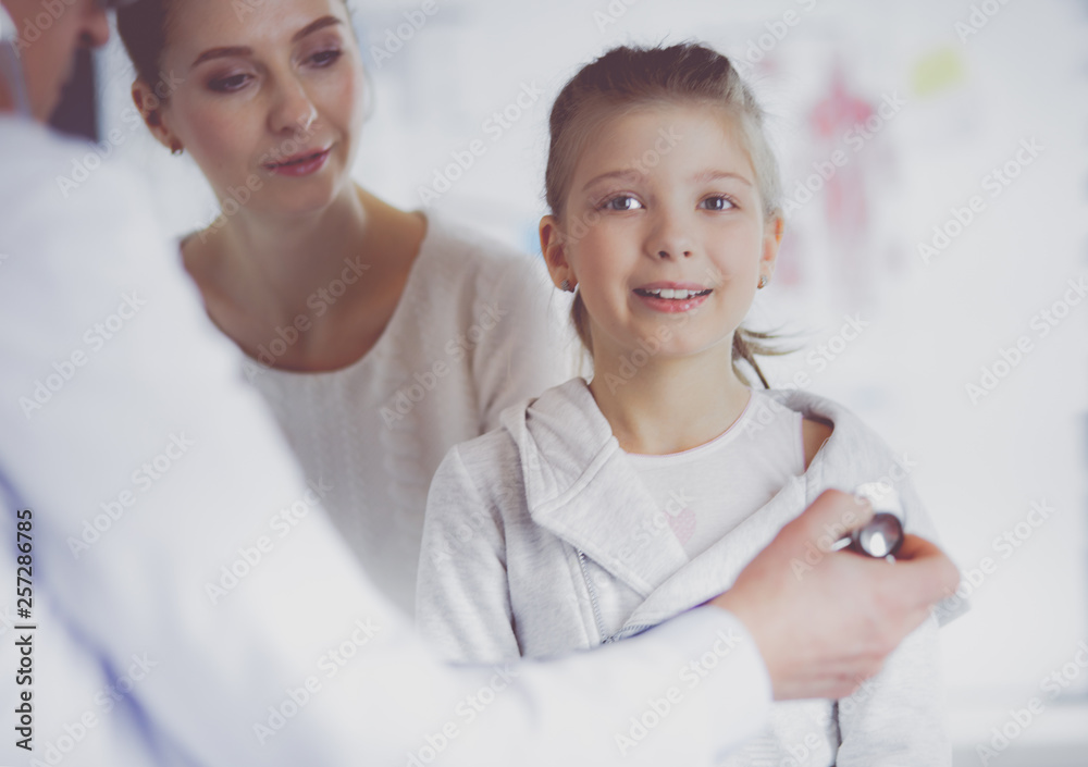 Little girl with her mother at a doctor on consultation Little girl with her mother at a doctor on consultation