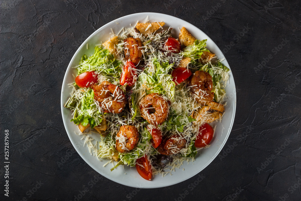 Caesar Salad with King Prawns, Parmesan Cheese and Cherry Tomatoes Caesar Salad with King Prawns, Parmesan Cheese and Cherry Tomatoes