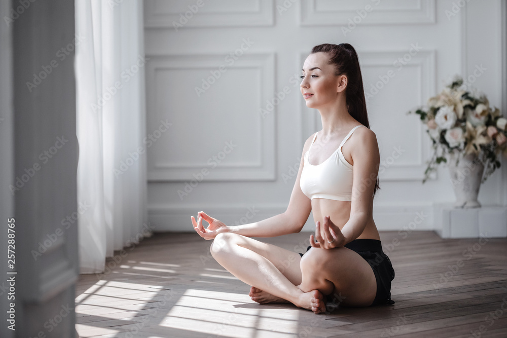 Portrait of young happy girl practicing yoga. Portrait of young happy girl practicing yoga.