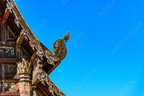 Naga wood carved at Chapel Roof. Wat Ton Kwen . Chiang mai THAILAND.