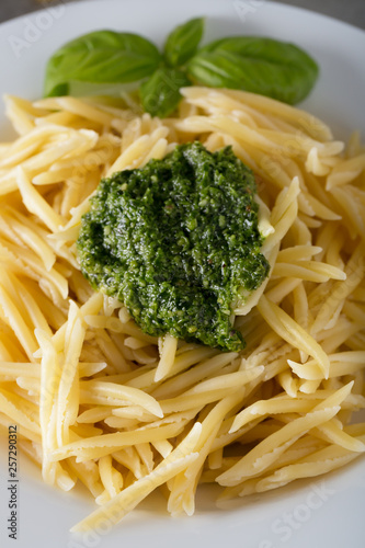 Classical italian trofie pasta with pesto sauce