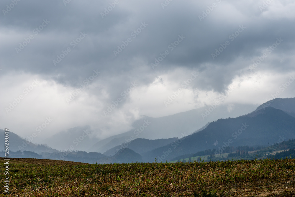 Fototapeta premium storm clouds over fields in slovakia