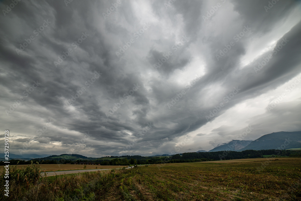 storm clouds over fields in slovakia