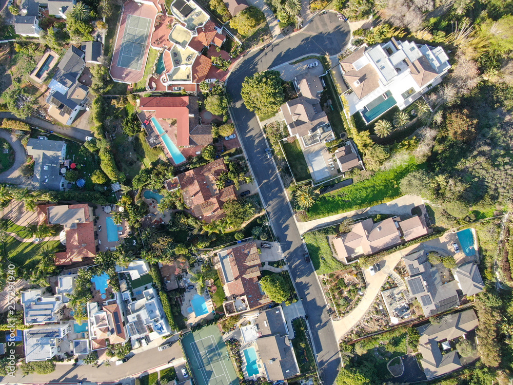 Aerial view of La Jolla little coastline city with nice beautiful wealthy villas with swimming pool. La Jolla, San Diego, California, USA.  West coast real estate development.