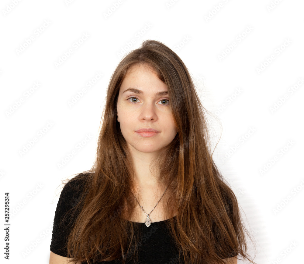 Portrait of brown-haired woman with long hair on white background Portrait of brown-haired woman with long hair on white background