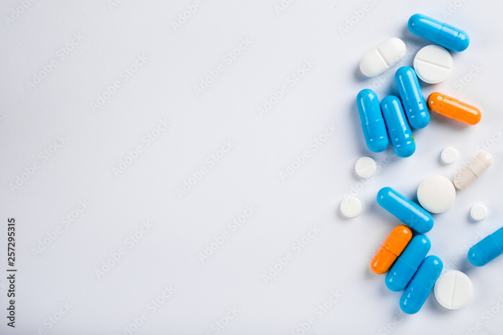 Assorted pharmaceutical medicine pills, tablets and capsules.Pills background. Assorted pharmaceutical medicine pills, tablets and capsules.Pills background.