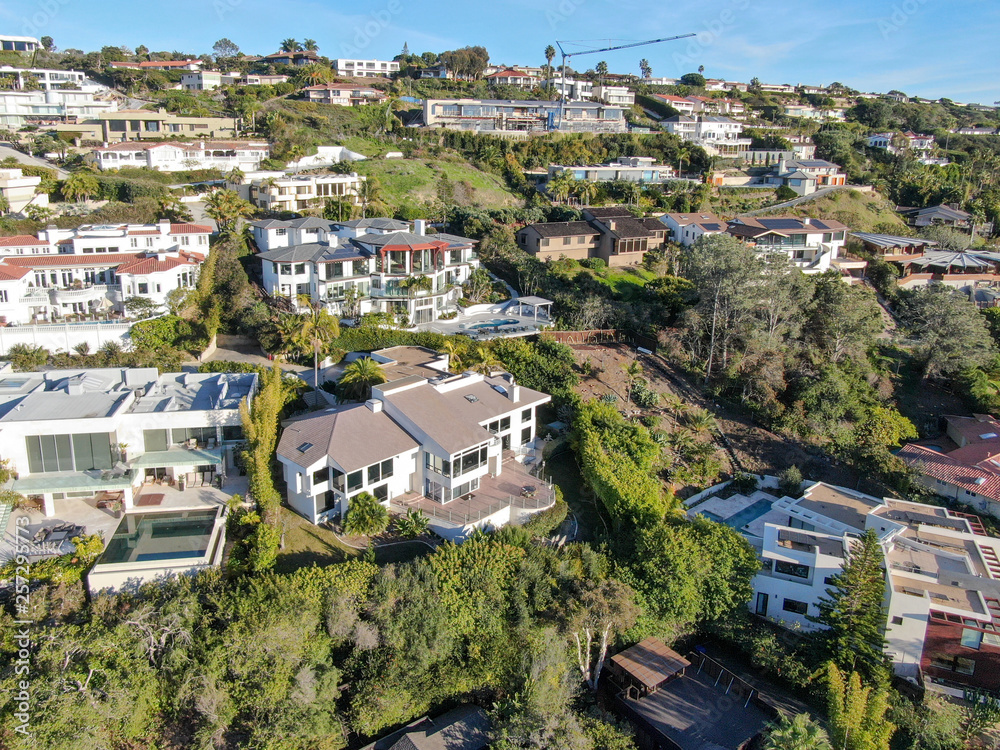 Aerial view of La Jolla little coastline city with nice beautiful wealthy villas with swimming pool. La Jolla, San Diego, California, USA.  West coast real estate development.