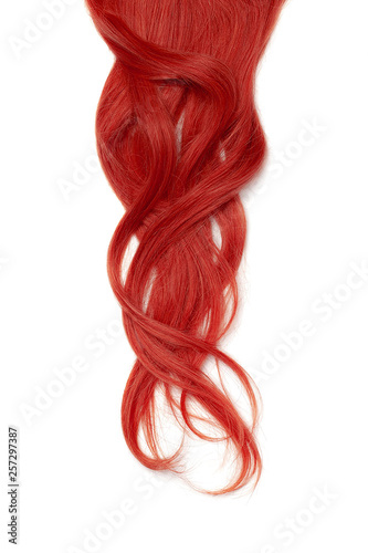 Long wavy red hair isolated on white background. High resolution