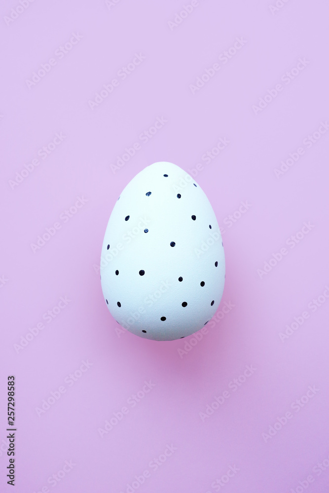 One Easter egg on pink background. Easter concept. One Easter egg on pink background. Easter concept.